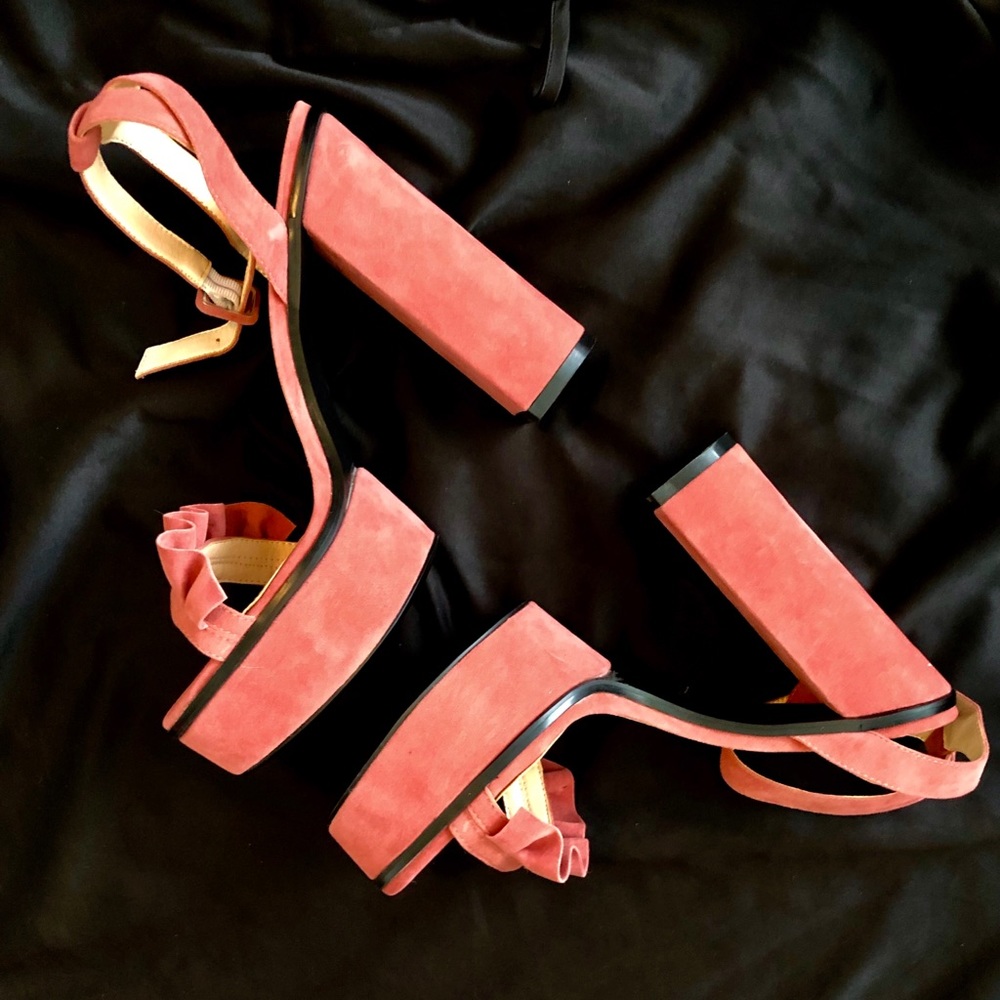 Blush coloured open toe sandals.