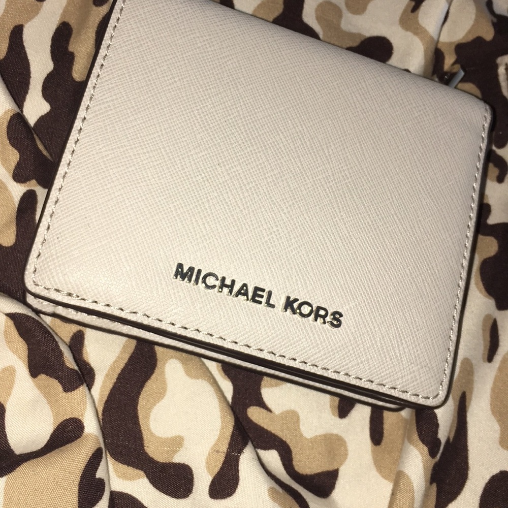 Great stocking stuffer! Cream Michael Kors wallet