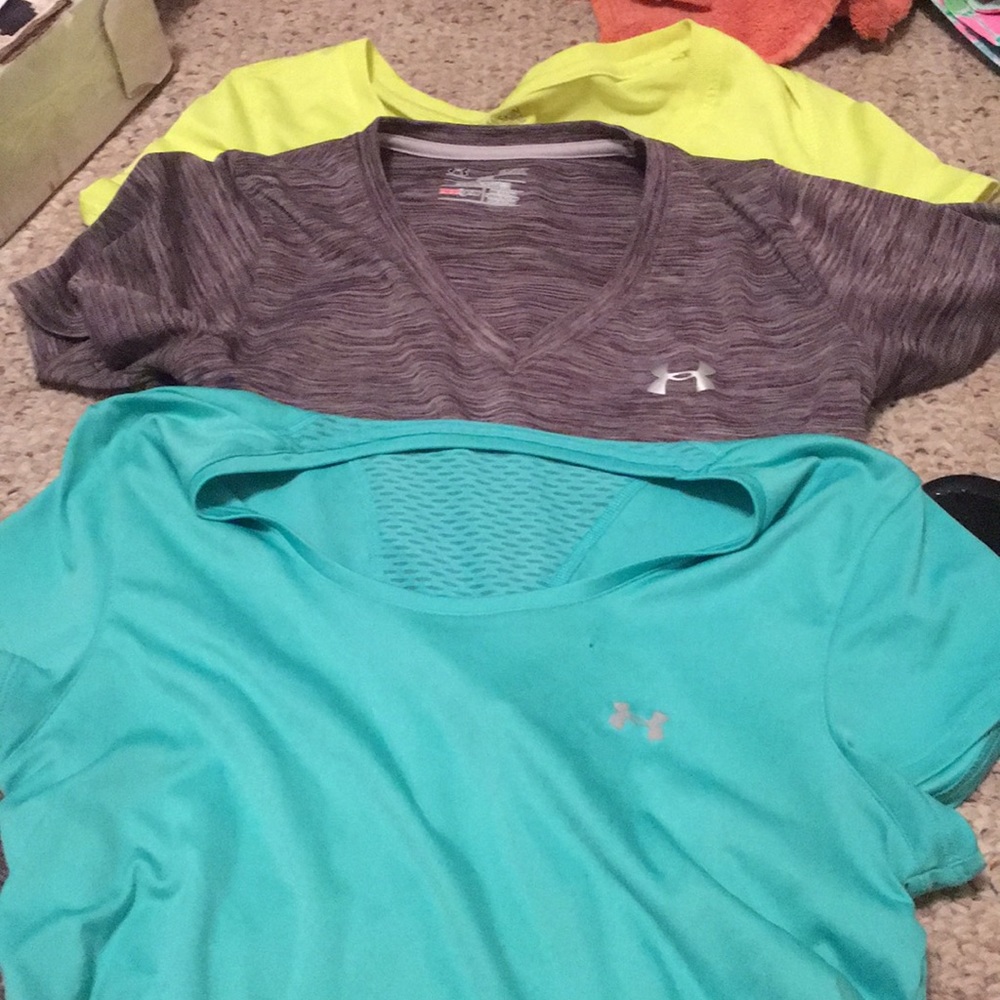 5 workout shirts. 4 under armour and 1 danskin.