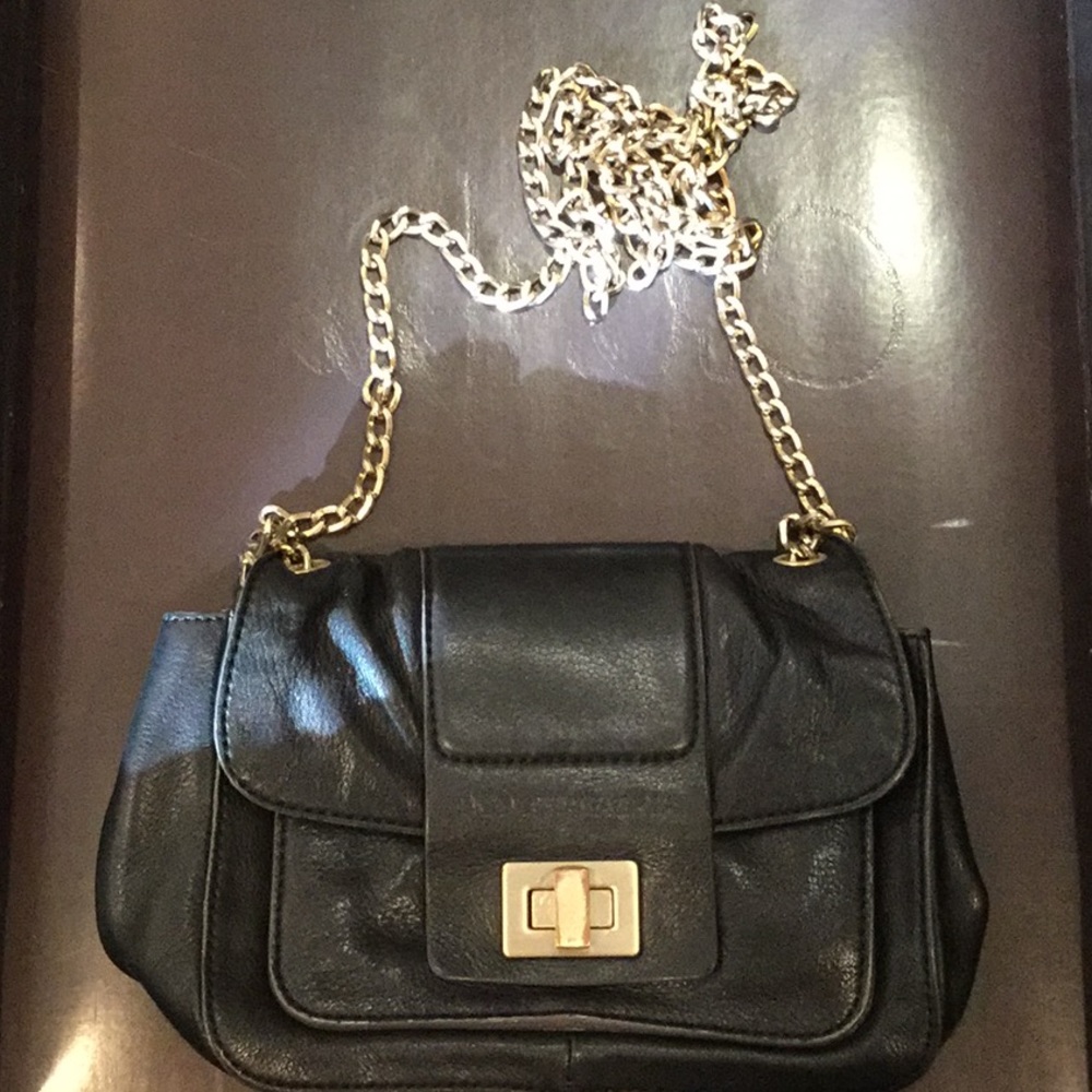 Black BCBG gold chain shoulder bag. 8” X 6” X 3”