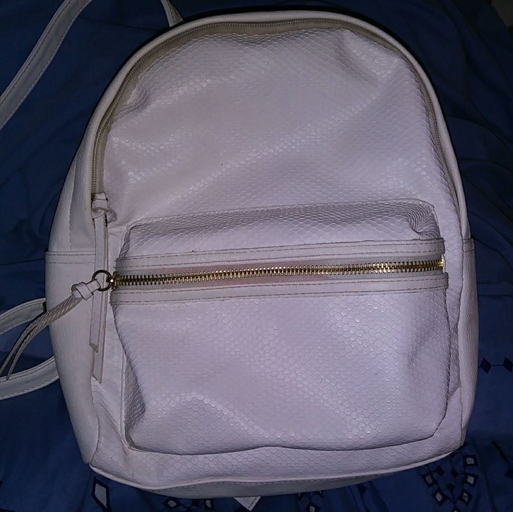 White little back pack