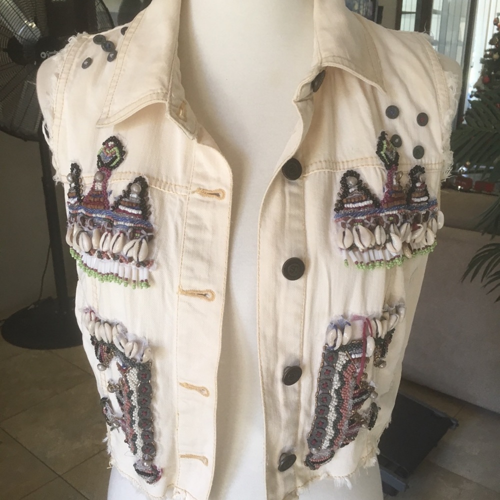 Sleeveless  jacket embellished beads and shells
