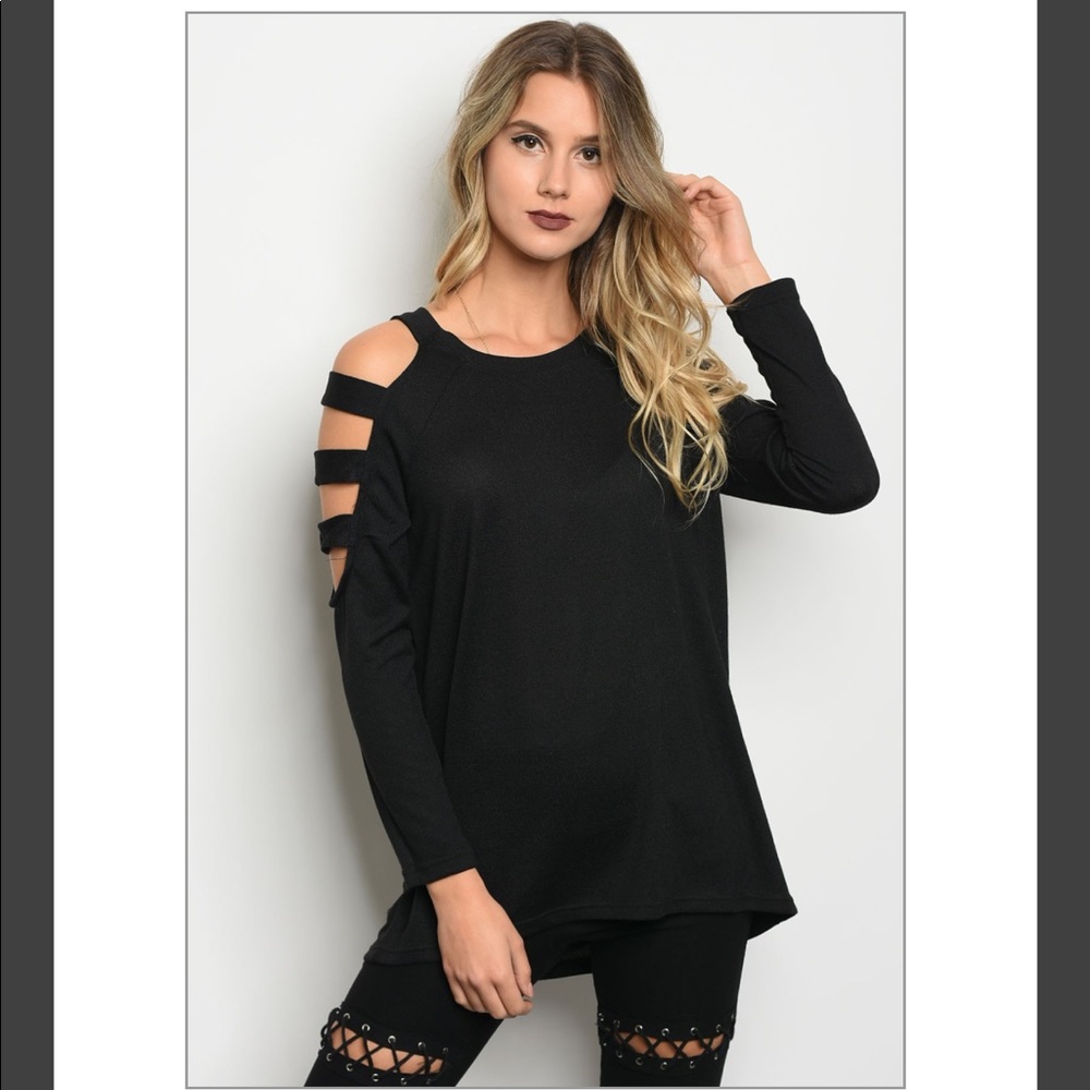 Black top with sleeve cutouts
