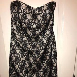 Formal black and white lace, strapless dress.