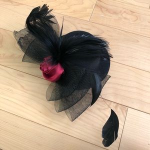 Small black hat with farther and hairclips