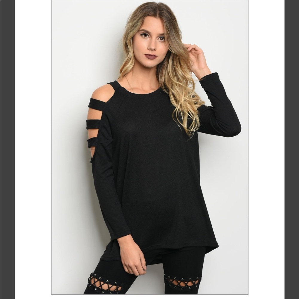 Long sleeve knit with a sleeve cutouts