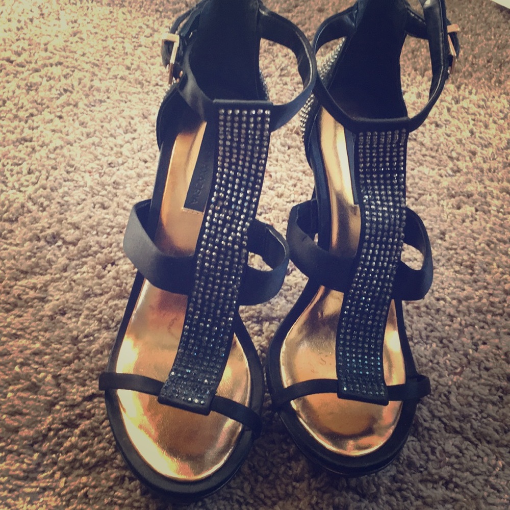 Black sparkly high heels with ankle strap