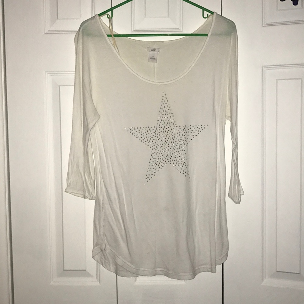 White shirt with star on front