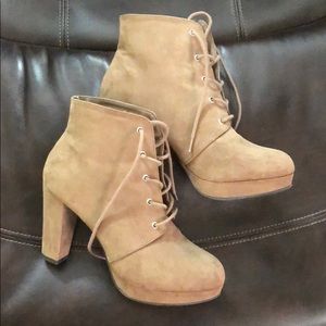 Light brown heel boots.
