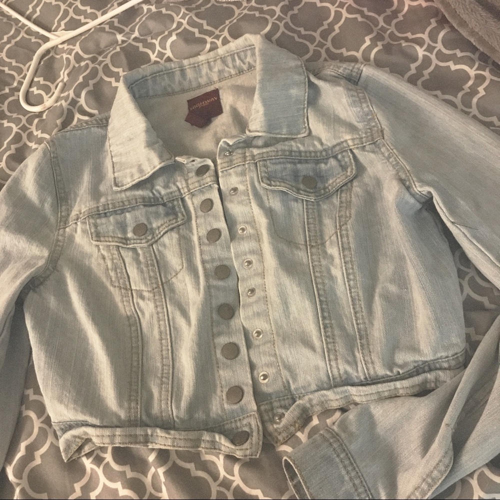 Small light denim jacket.
