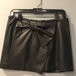 Leatherette Bow Front Mini Skirt