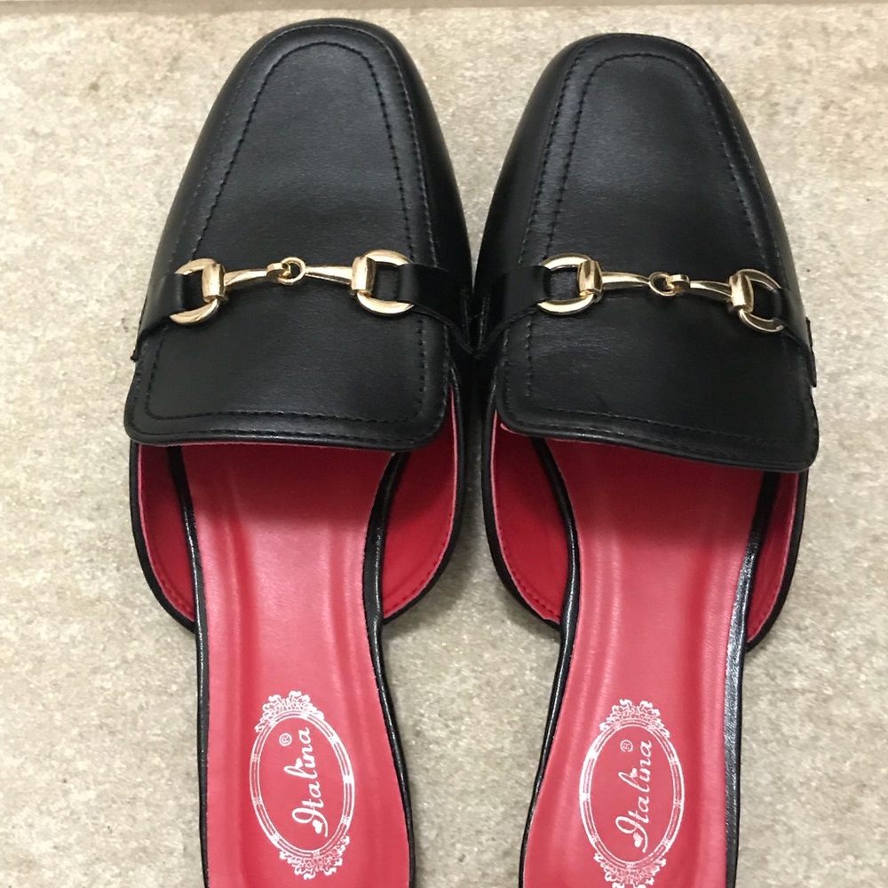 Black Mule loafers with gold tone hardware