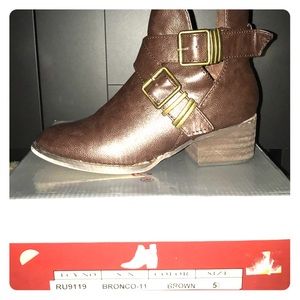 Brown buckled booties