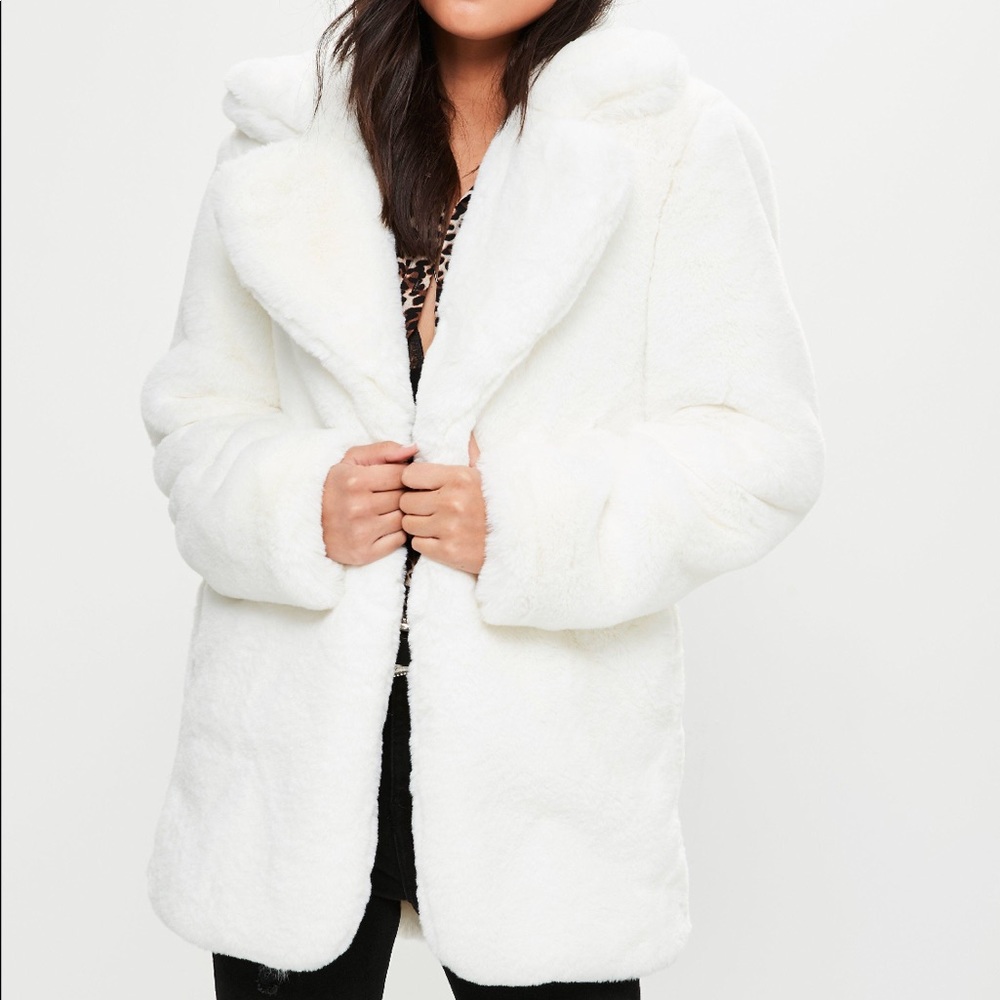 White faux fur coat