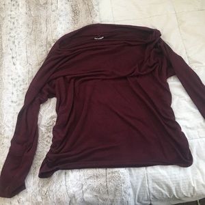 Maurice’s wine-colored sweater