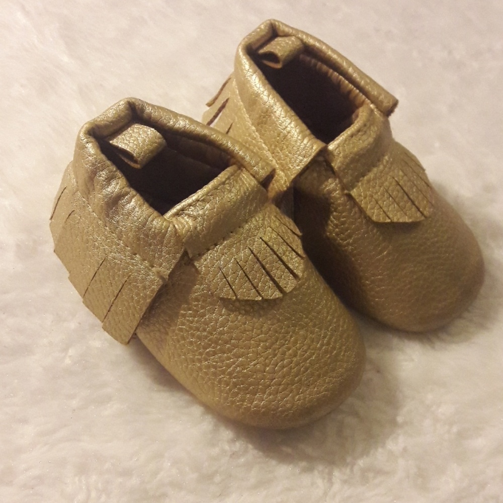 Gold moccasins