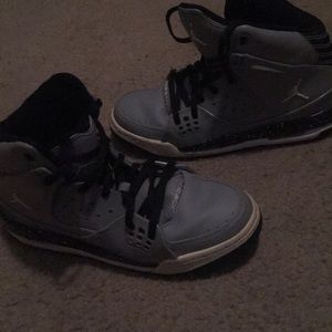 Grey and black Jordans