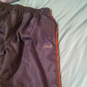 Gray FILA kids 14/16 wind pants with orange stripe