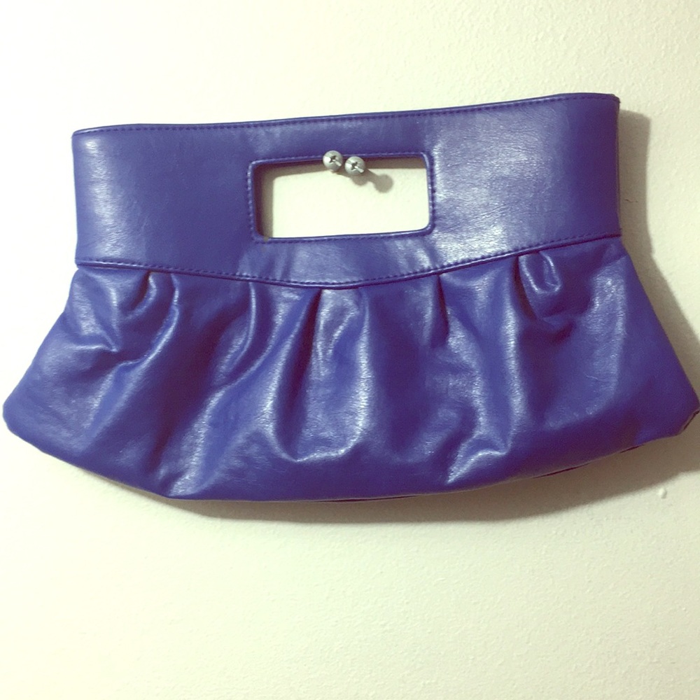 Blue hand purse used 1 pocket