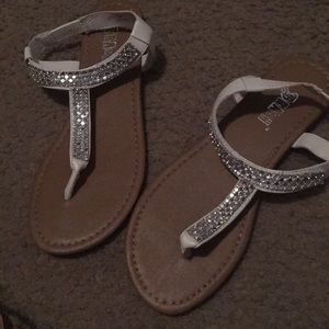 White and tan sandals