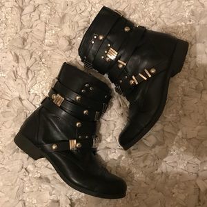 Black ankle boots with silver details