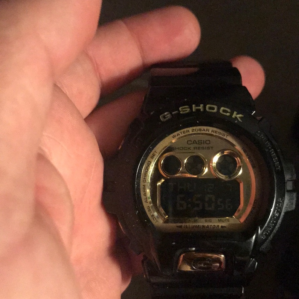 Black and gold g shock
