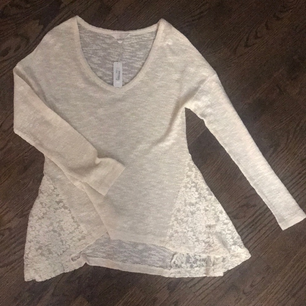 Cream sweater with lace bottom