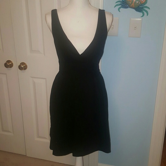 Johnny Martin Dresses & Skirts - Sexy little black dress Johnny Martin M