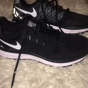 Black Nike running shoes