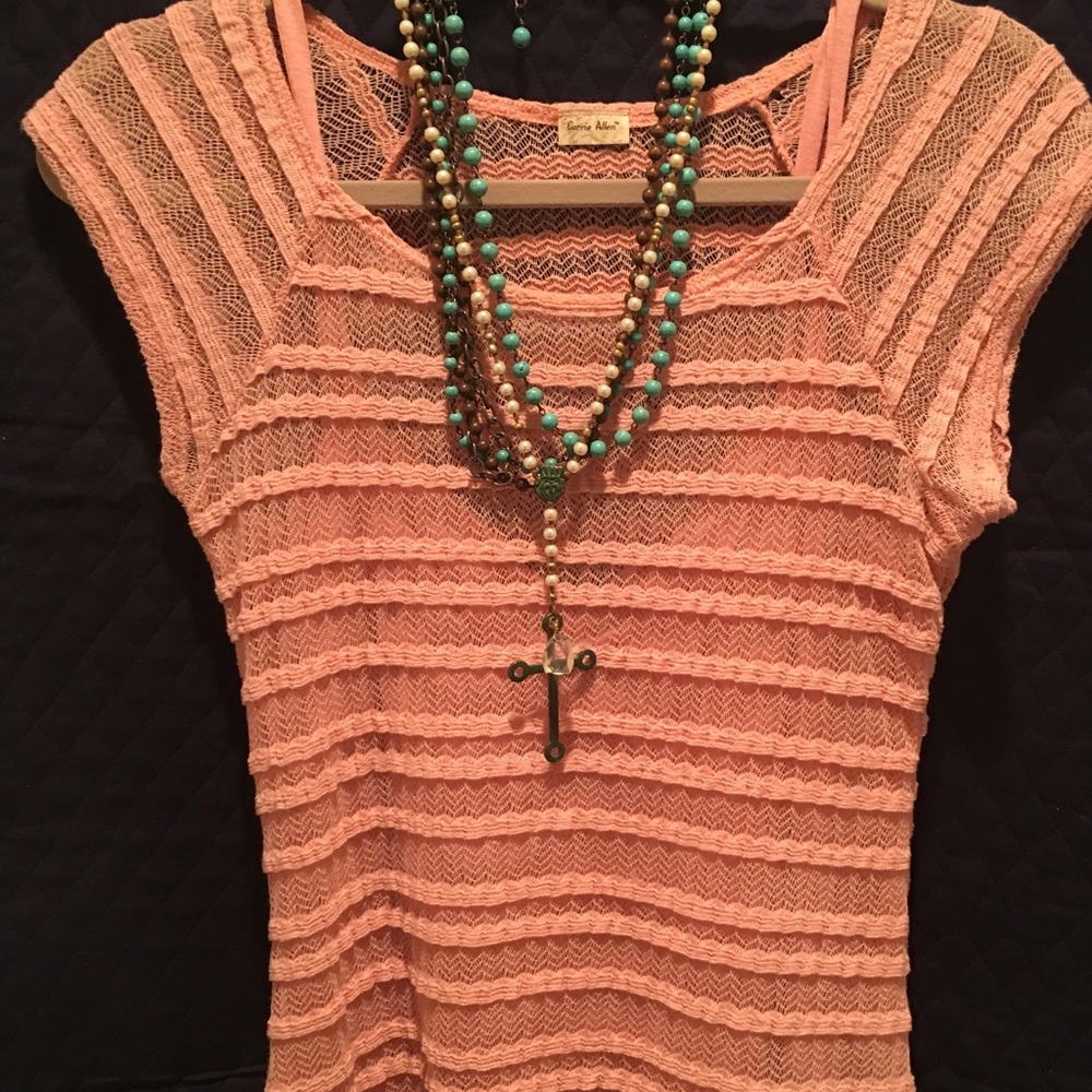 Carrie Allen pail pink top with matching camisole.