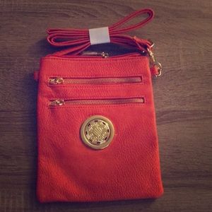 NWOT! Orange cross body. CLEARANCE