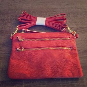 NWOT! CLEARANCE! Small orange handbag/clutch