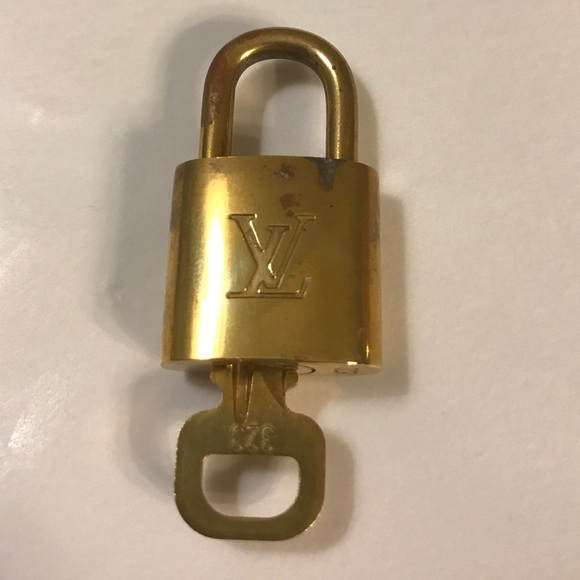 Louis Vuitton Accessories - Authentic Posh Compliant Louis Vuitton Lock Key