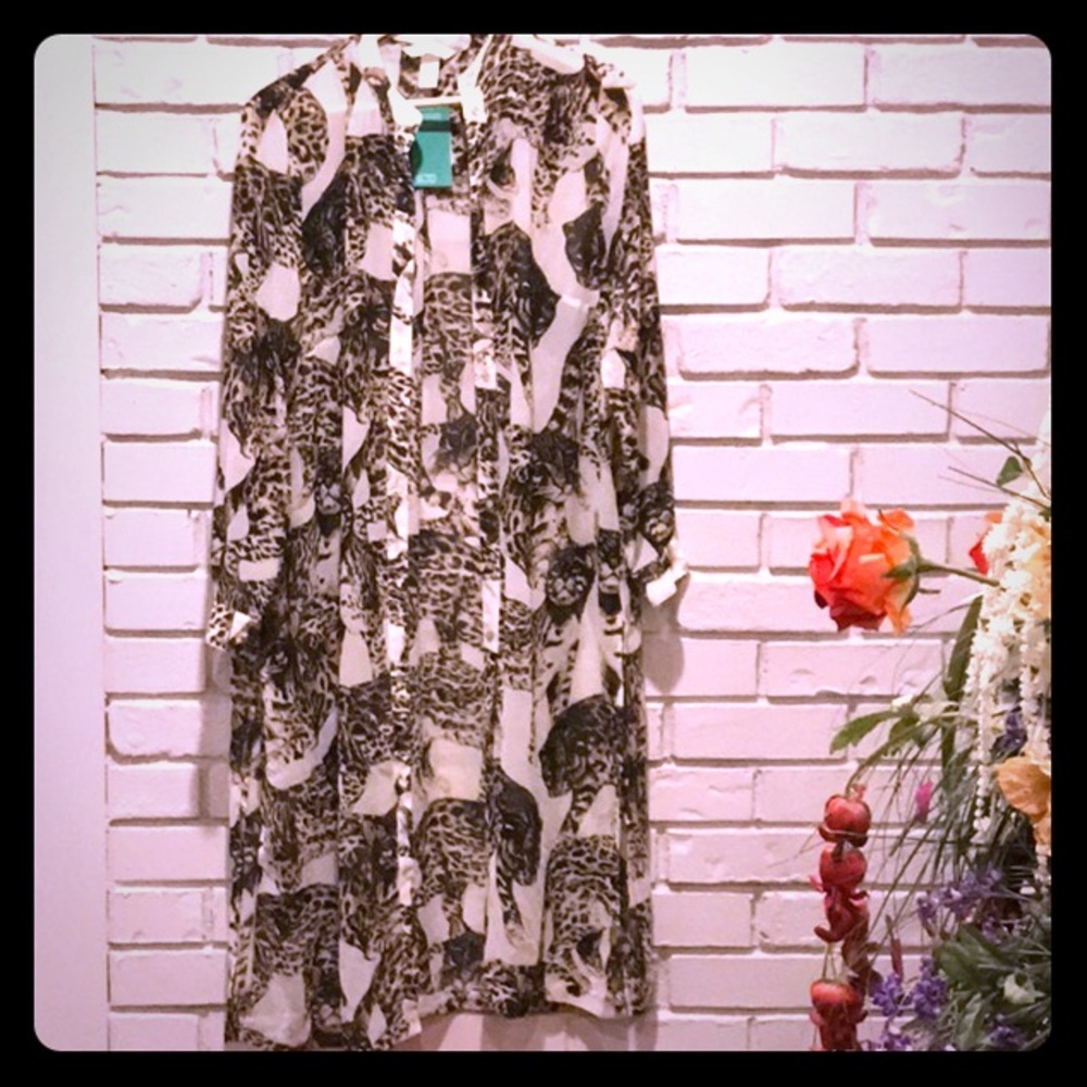 Long sleeve,buttoned down, knee length blouse H&M