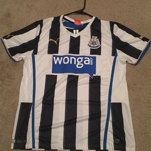 Puma Newcastle United soccer jersey.