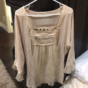 Cream blouse with bell end sleeves