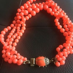 Coral beetle clasp necklace