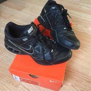 Size 8.5 Nike (basketball?) shoes.