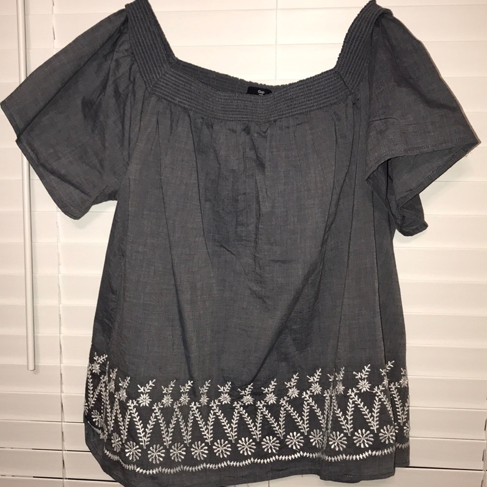 Fun off the shoulder shirt.