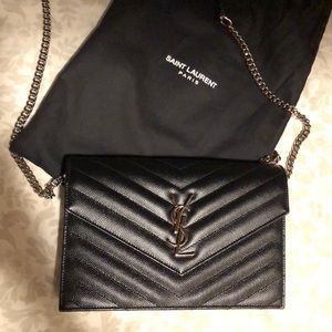 YSL MONOGRAM ENVELOPE CHAIN WALLET IN BLACK GRAIN