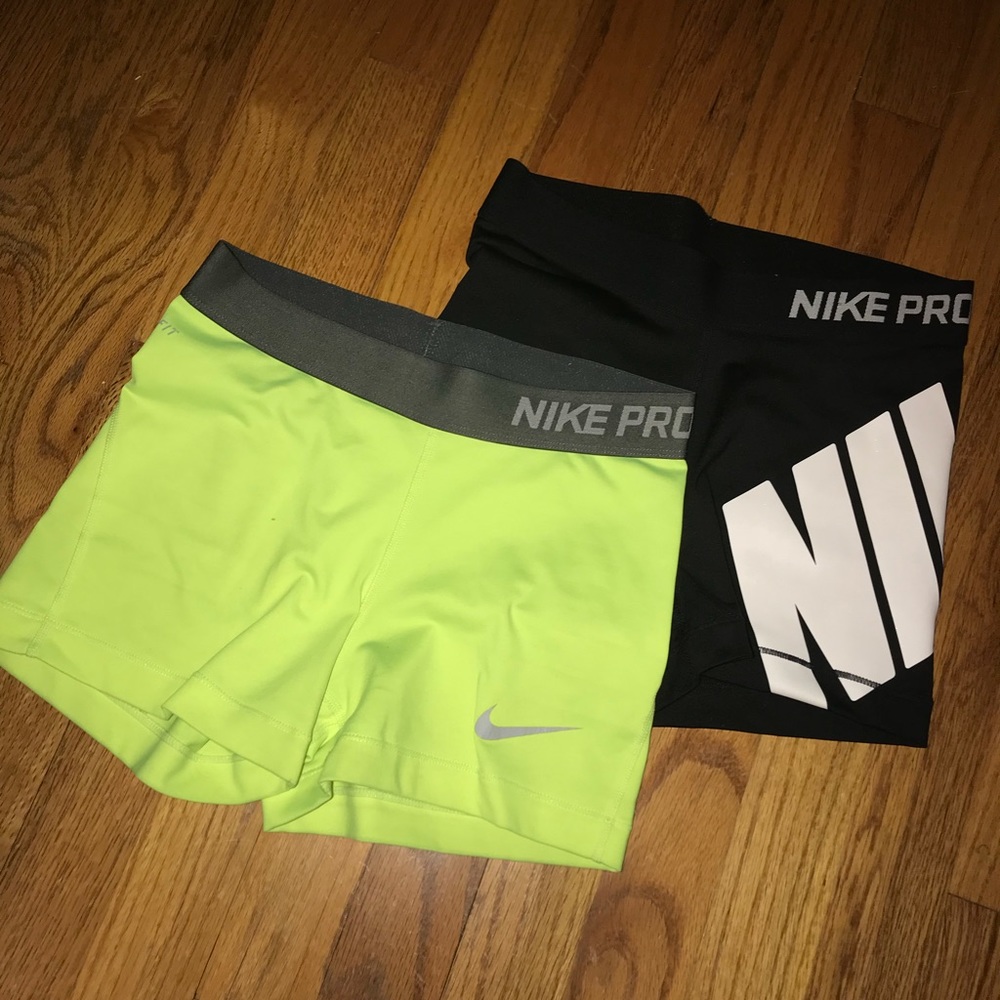 2 pairs of Woman’s Nike Pro Compression