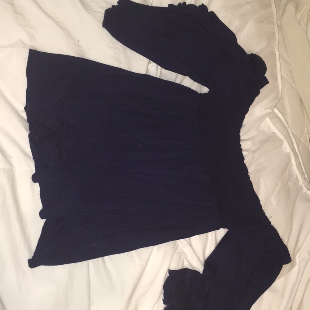 A blue off the shoulder blouse