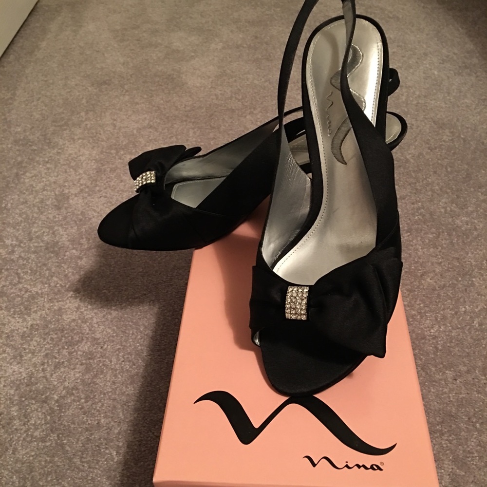 Nina Gyris satin sling back heels.