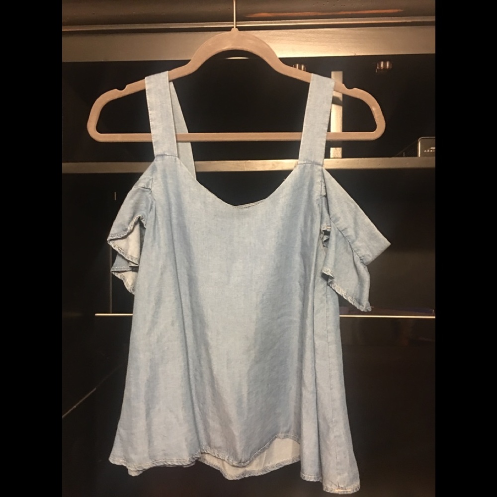 Cute light blue top. You can see your shoulders