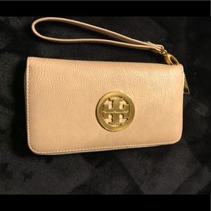 Beige Tory Burch zippered wristlet