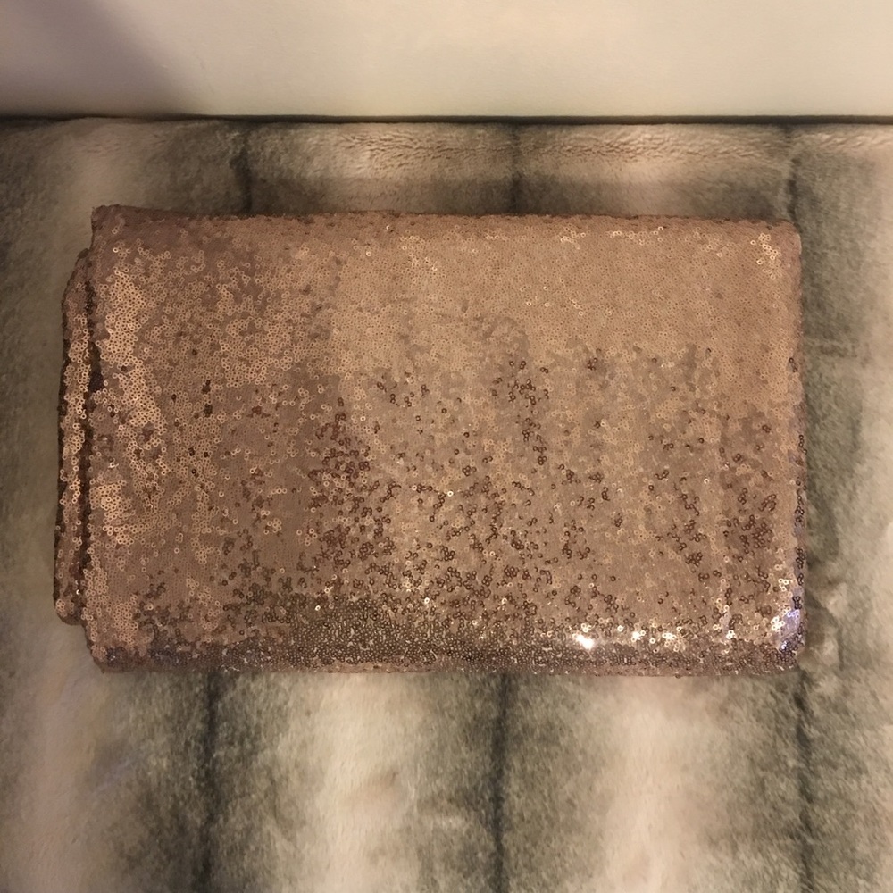 Beautiful Rose gold séquense table cloth.