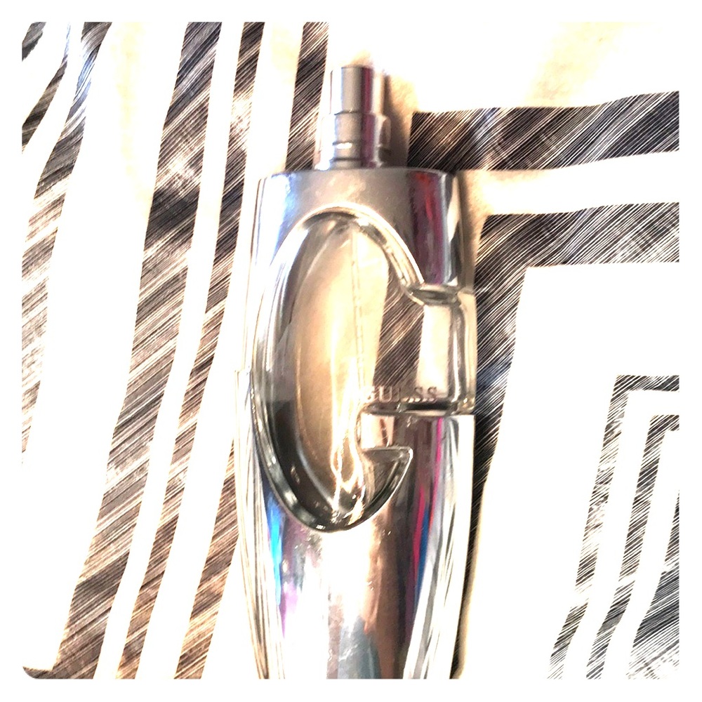 Guess empty bottle