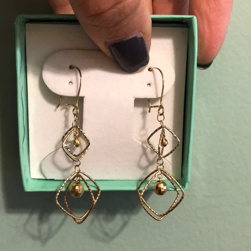 Gold and silver colored dangle earrings