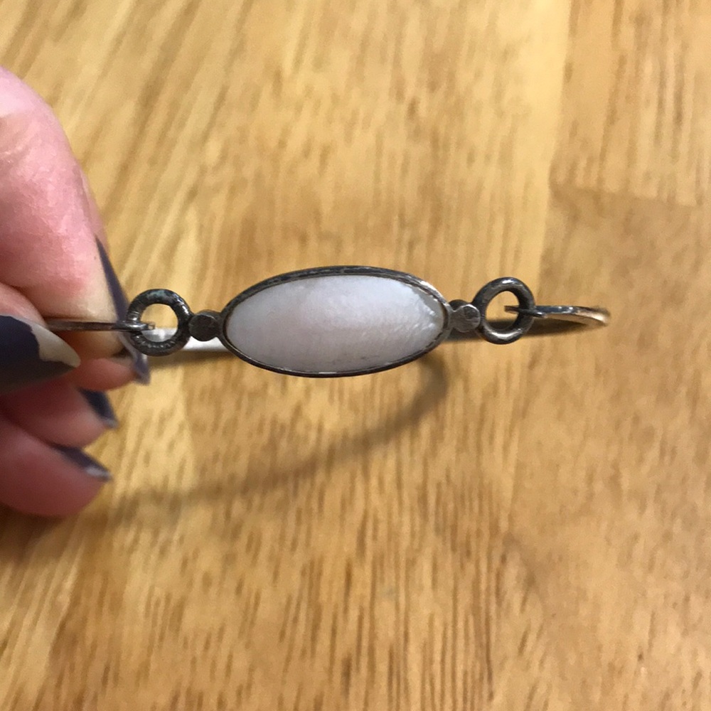 Silver bracelet.