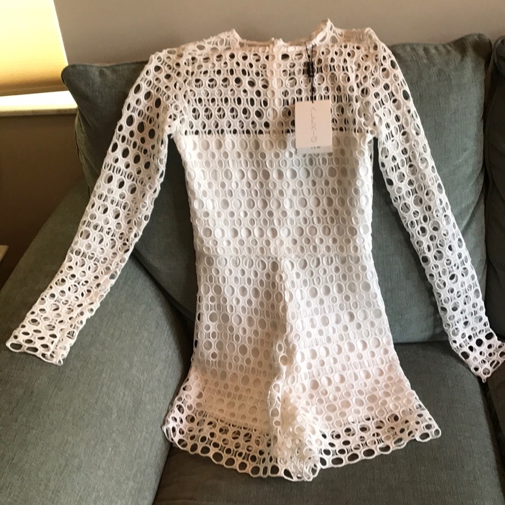 Alexis white jumpsuit. Never worn. Tags still on.